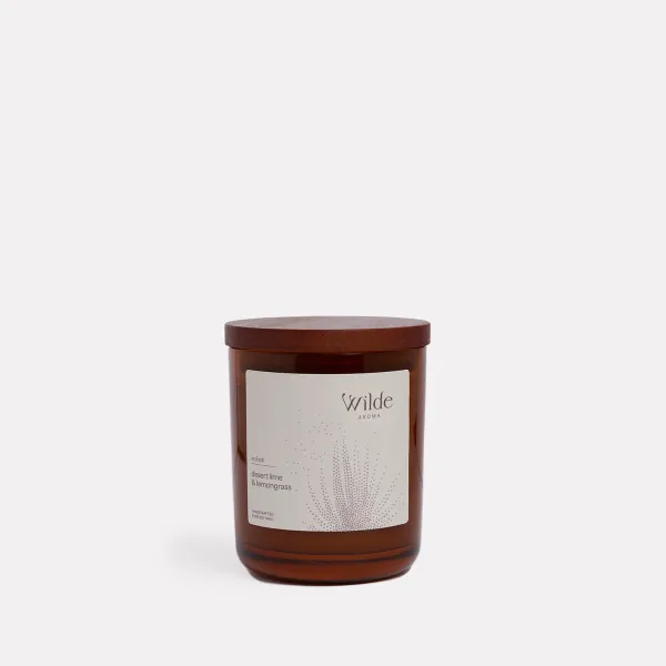 scented candle lemongrass & persian lime by wilde aroma Brown candle with Wilde Aroma label, white background.