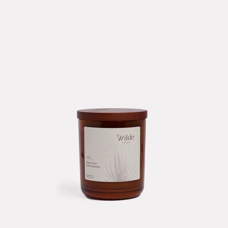 scented candle lemongrass & persian lime by wilde aroma Brown candle with Wilde Aroma label, white background.