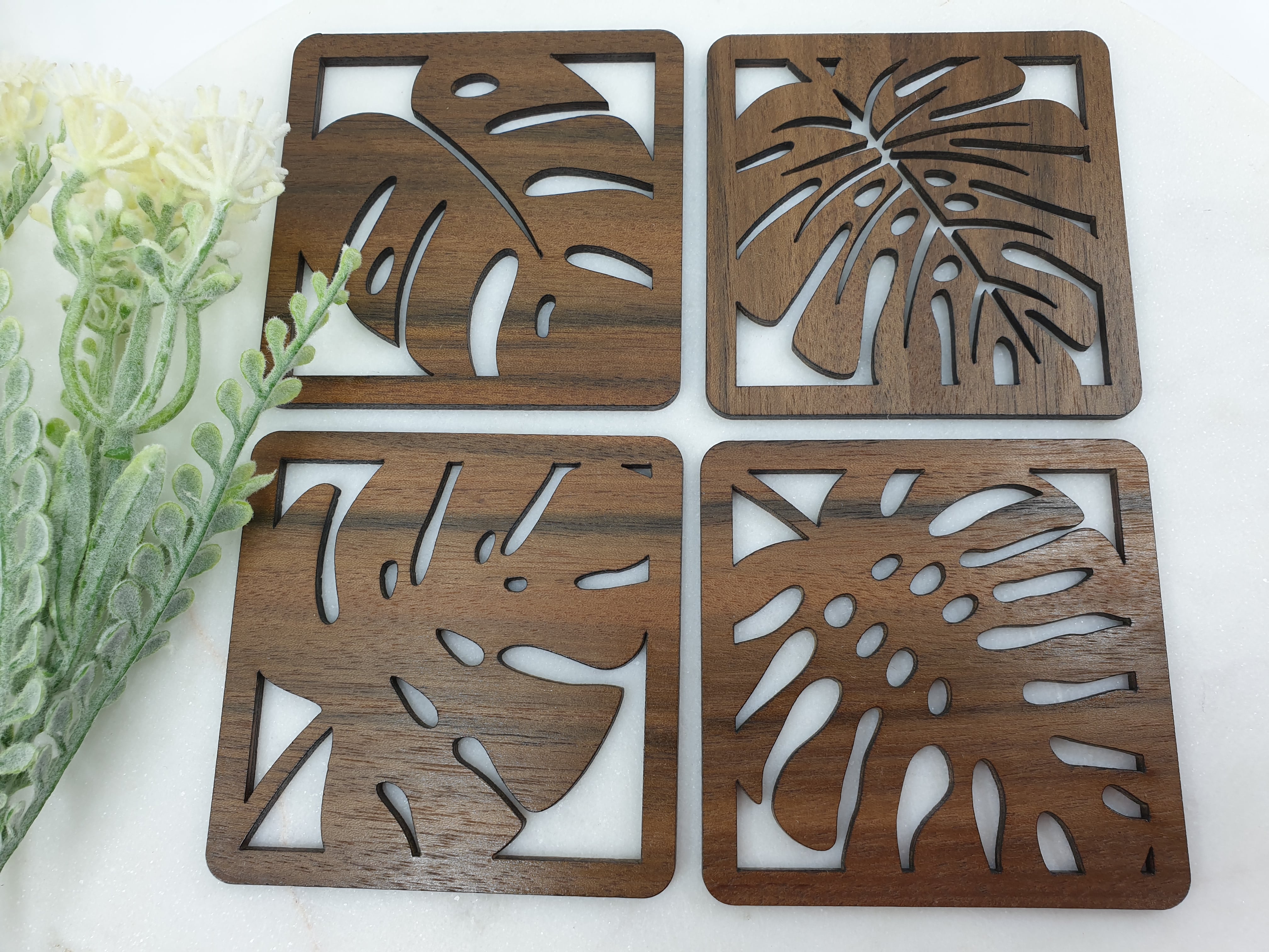 Monstera wooden coasters made from queensland walnut