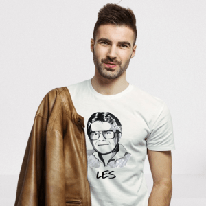 Man wearing white t-shirt and brown leather jacket