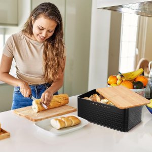 bread bin with bamboo lid used as chopping board for kitchen countertop