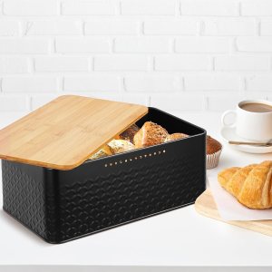 bread bin with bamboo lid used as chopping board for kitchen countertop