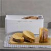bread bin with bamboo lid used as chopping board for kitchen countertop