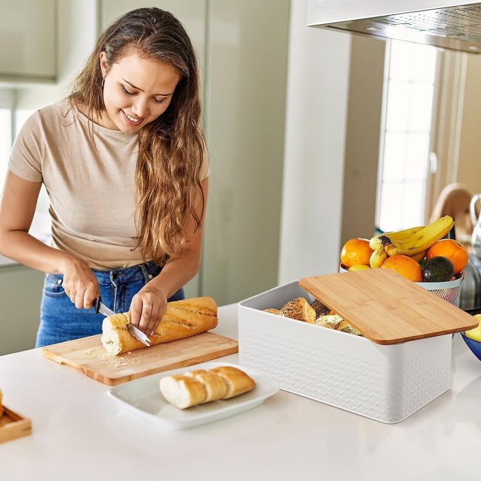 bread bin with bamboo lid used as chopping board for kitchen countertop
