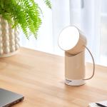 lexon orbe portable led lamp with moving head pantone sand