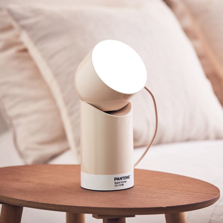 lexon orbe portable led lamp with moving head pantone sand