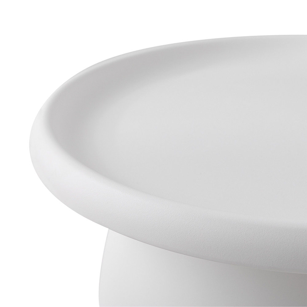 Close-up of curved white table edge