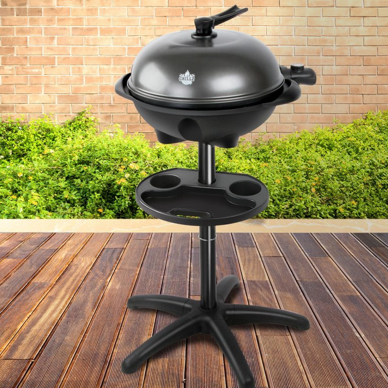 Outdoor electric barbecue on wooden deck