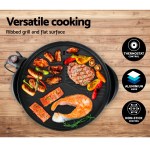 Versatile grill with thermostat, non-stick surface.