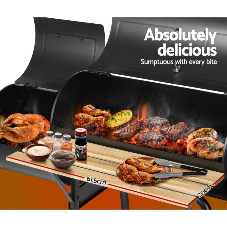 grillz bbq grill 2 in 1 offset charcoal smoker Barbecue grill with assorted meats and condiments.