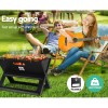 Outdoor BBQ with guitar and relaxation.