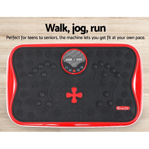 everfit vibration machine platform vibrator with resistance rope home gym red Red exercise vibration plate on wooden floor.
