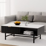 Modern living room with coffee table and grey sofa.