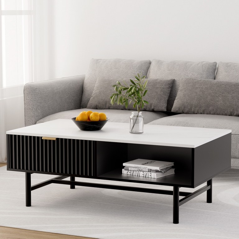 Modern living room with coffee table and grey sofa.