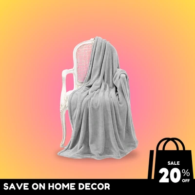 Grey throw blanket on chair, 20% off sale.