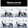 everfit rowing machine air rower exercise fitness gym home cardio Man demonstrating rowing exercise on machine indoors.