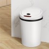 White touchless kitchen bin on wooden floor
