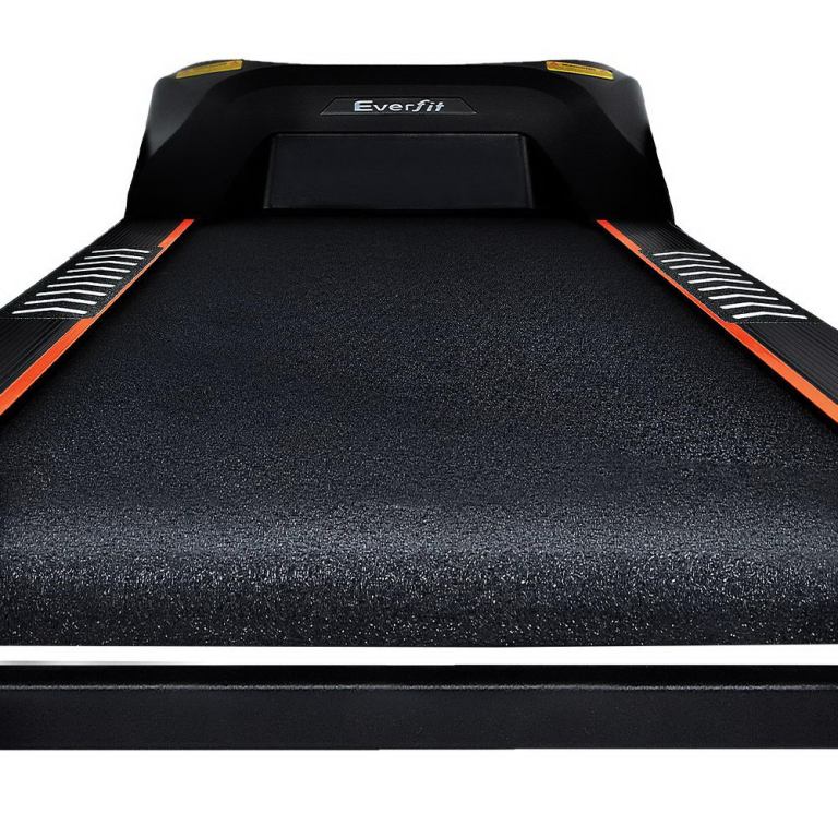 Black treadmill with textured running surface