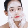 cleansing mousse | makeup removal | deep cleansing | nourishing Woman applying foaming facial cleanser.