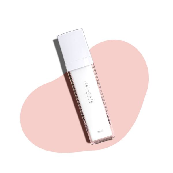 v1052 la moisturizer 202507070840 00.jpg White cosmetic bottle on pink background