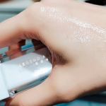 emulsion spray | triple action | super moisturizing | acne & spot removal Hand applying moisturising cream for skincare
