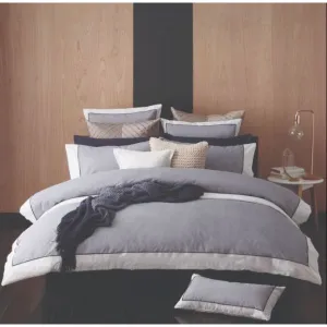 Stylish grey and white bedding set with pillows