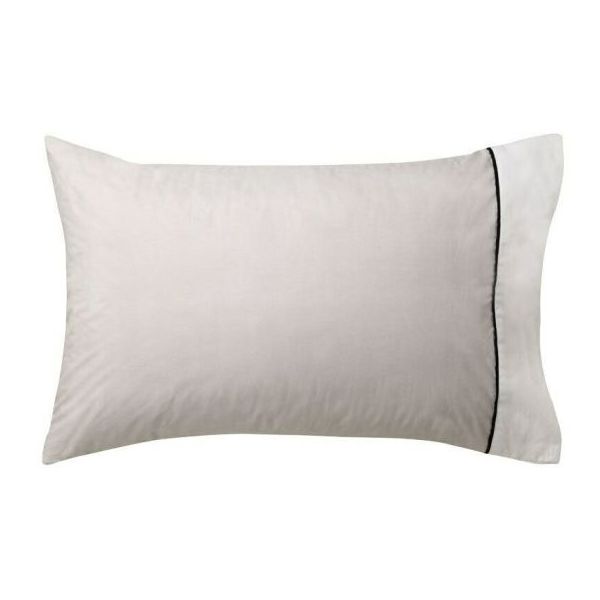 White pillow with black edge