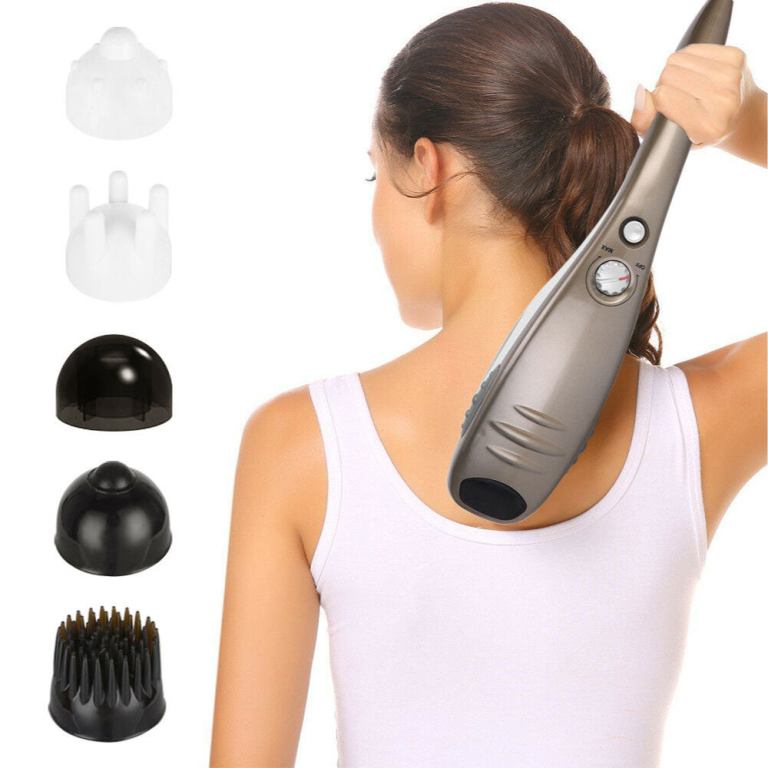 Woman using handheld massager with multiple attachments