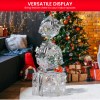 swishmas 83cm triple christmas silver giftbox stack display with lights Christmas gifts and tree in cosy decorated living room.