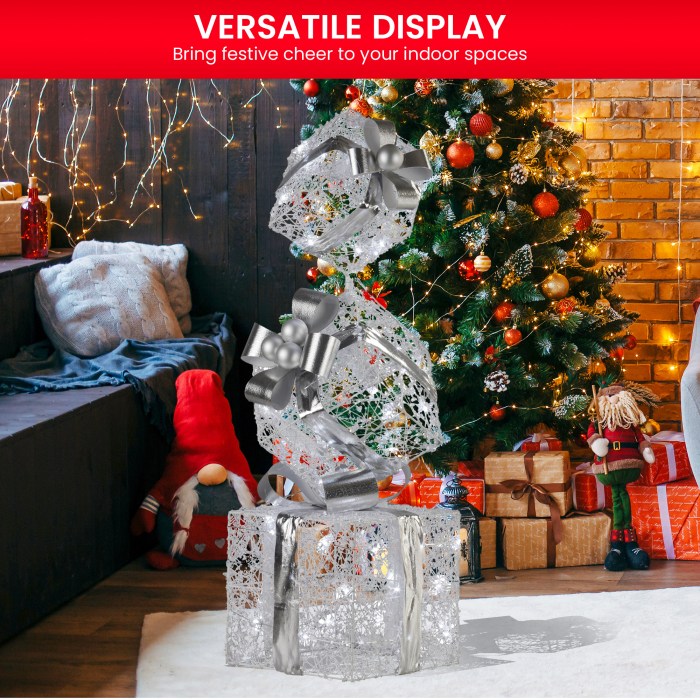 swishmas 83cm triple christmas silver giftbox stack display with lights Christmas gifts and tree in cosy decorated living room.