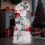 Christmas presents and tree by fireplace, festive decorations