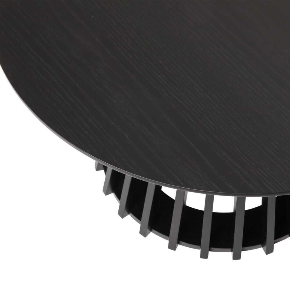 Black round table close-up with slatted base design.