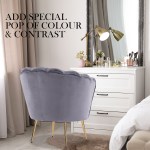 Elegant room with purple chair and white dresser.