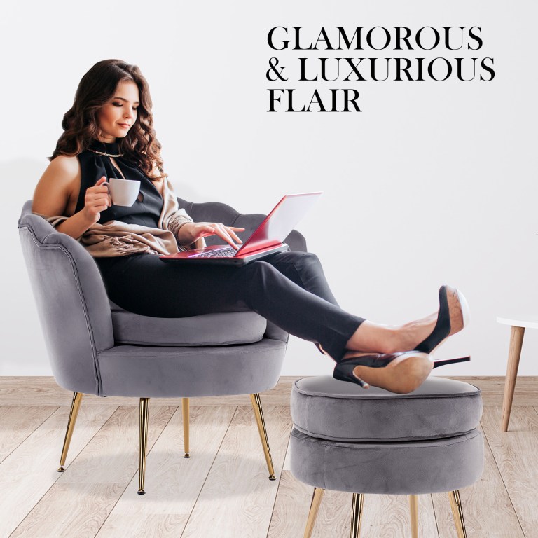 Woman relaxing with coffee and laptop in chair.