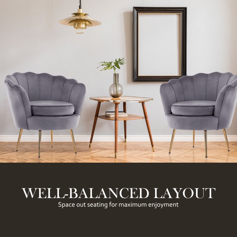 Elegant living room with grey chairs and table.