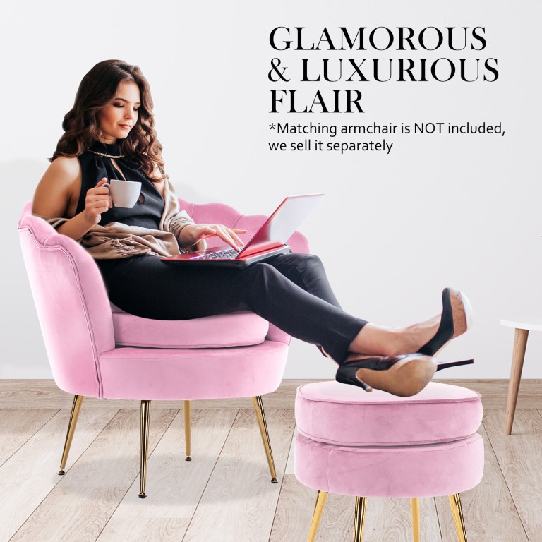ottoman foot stool velvet fabric metal leg round pink Woman relaxing on pink chair with laptop, coffee.