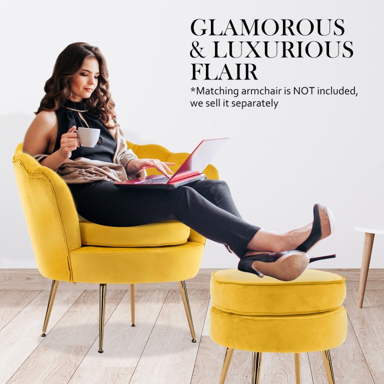 ottoman foot stool velvet fabric metal leg round yellow Woman relaxing on yellow chair with laptop, coffee.