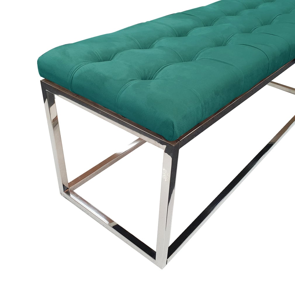 Green upholstered bench with chrome legs.
