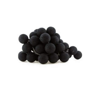 Pile of black textile balls on white background.