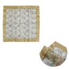 Gold and white Christmas themed tablecloth.