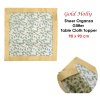 Gold holly tablecloth with sheer organza border.