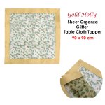 Gold holly tablecloth with sheer organza border.