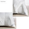 bianca pure microfibre all seasons quilt king Bianca white bedding set on carpeted floor