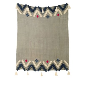 Wool blanket with geometric patterns and tassels.