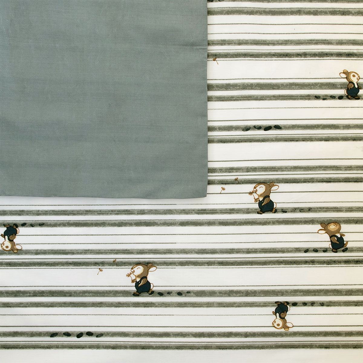 Striped cloth with cartoon mice pattern.