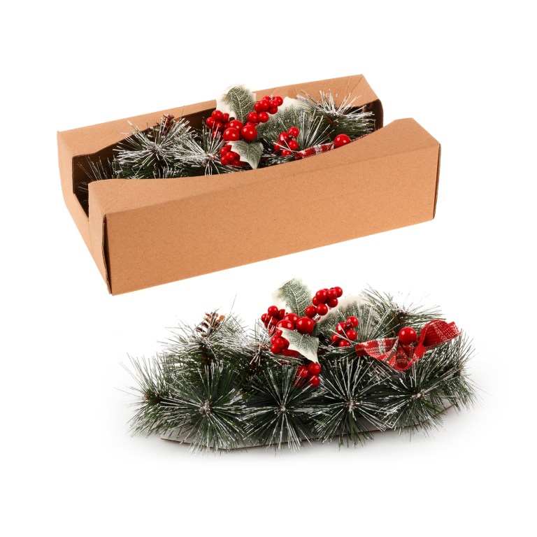 Christmas wreath with red berries in box.