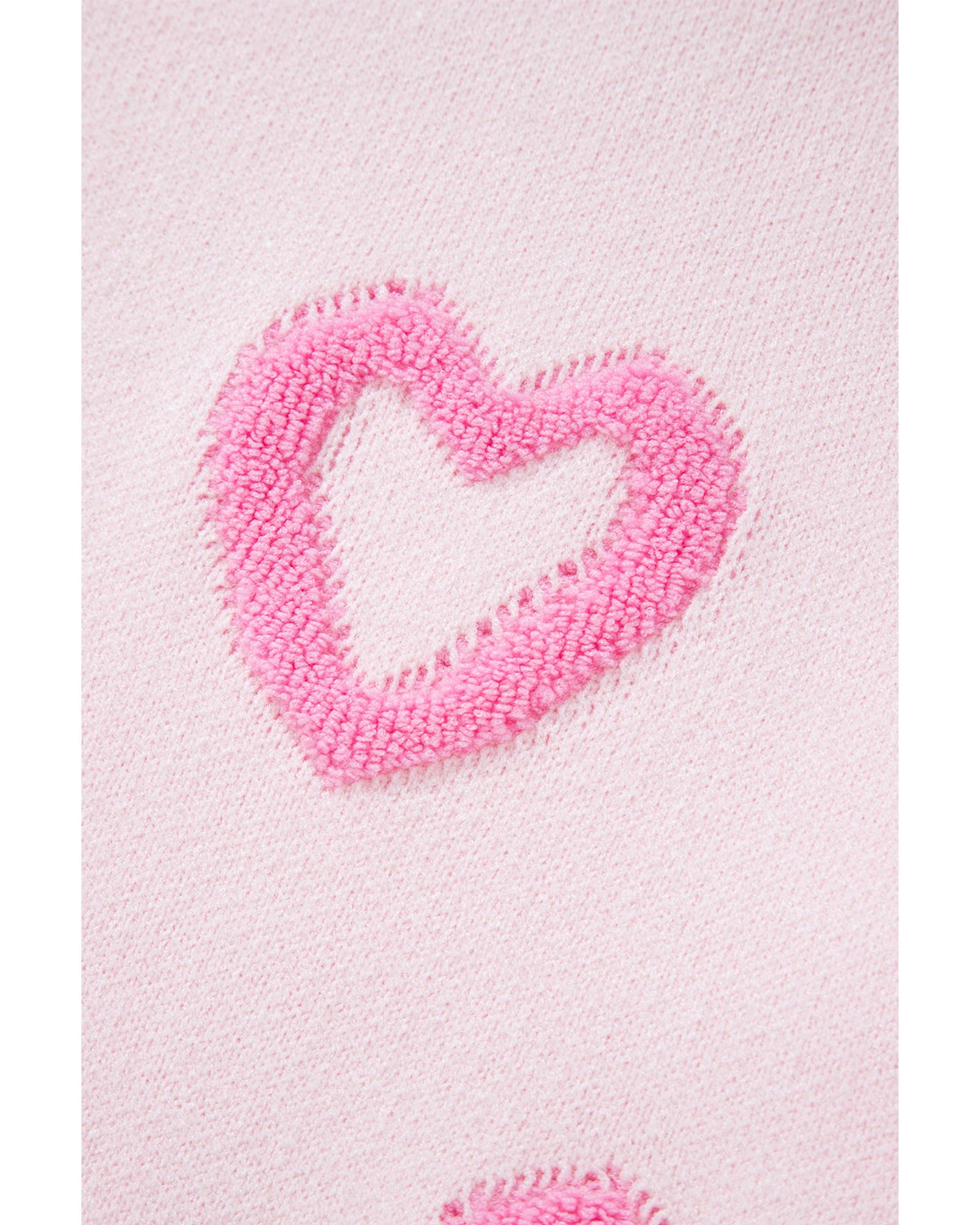 Pink heart embroidery on light pink fabric.