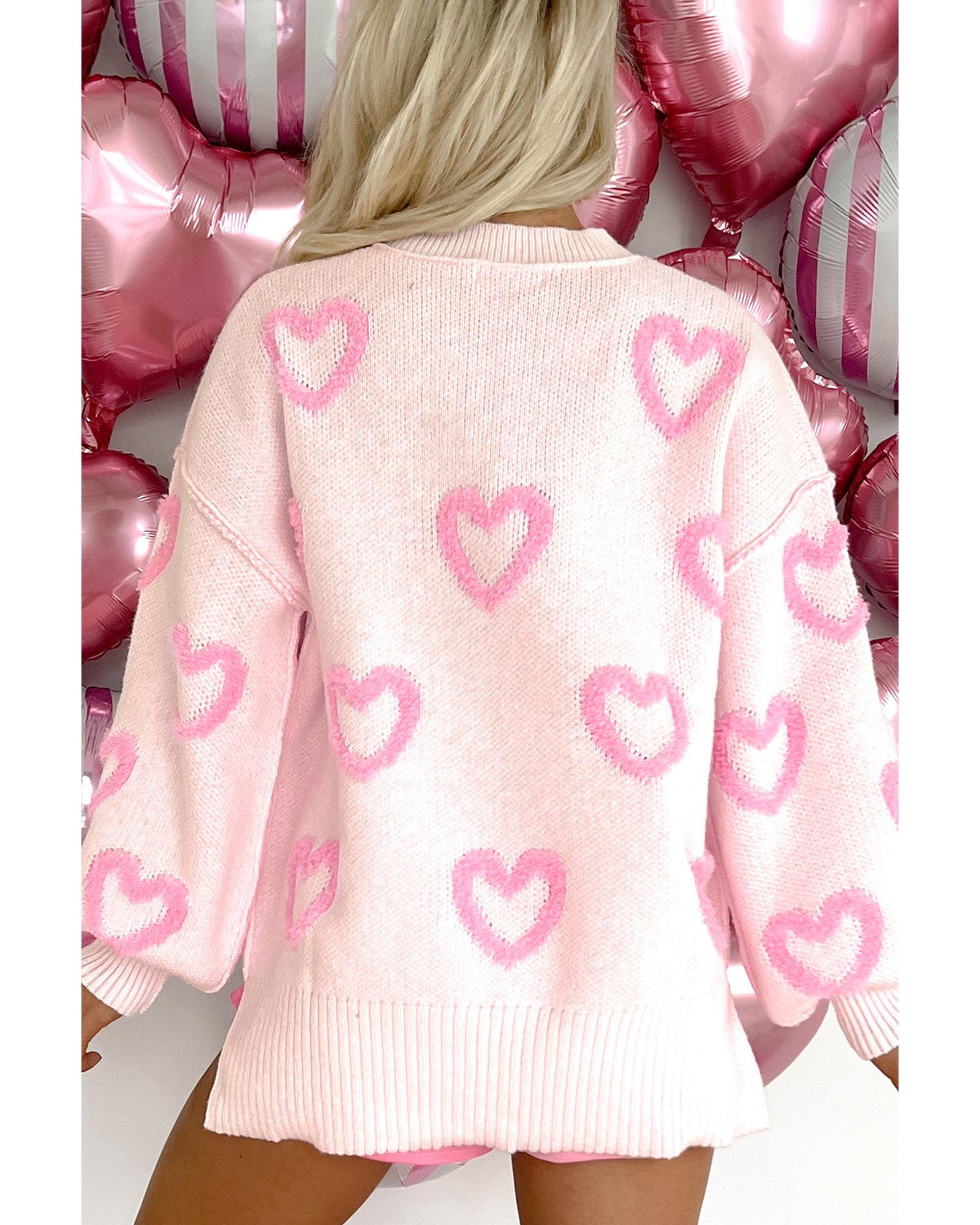 Pink jumper with heart pattern and balloons