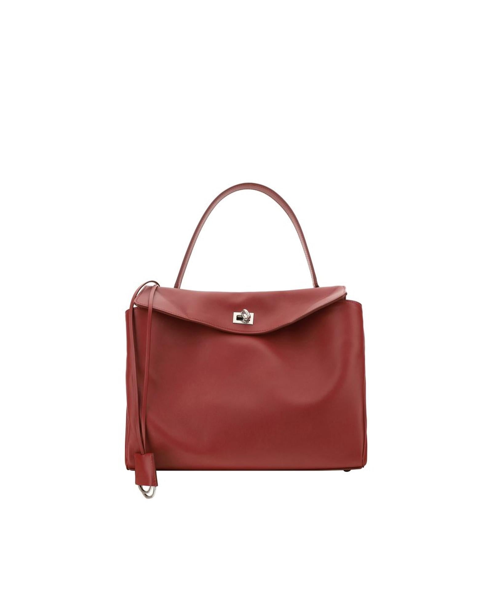 Elegant maroon leather handbag with top handle.