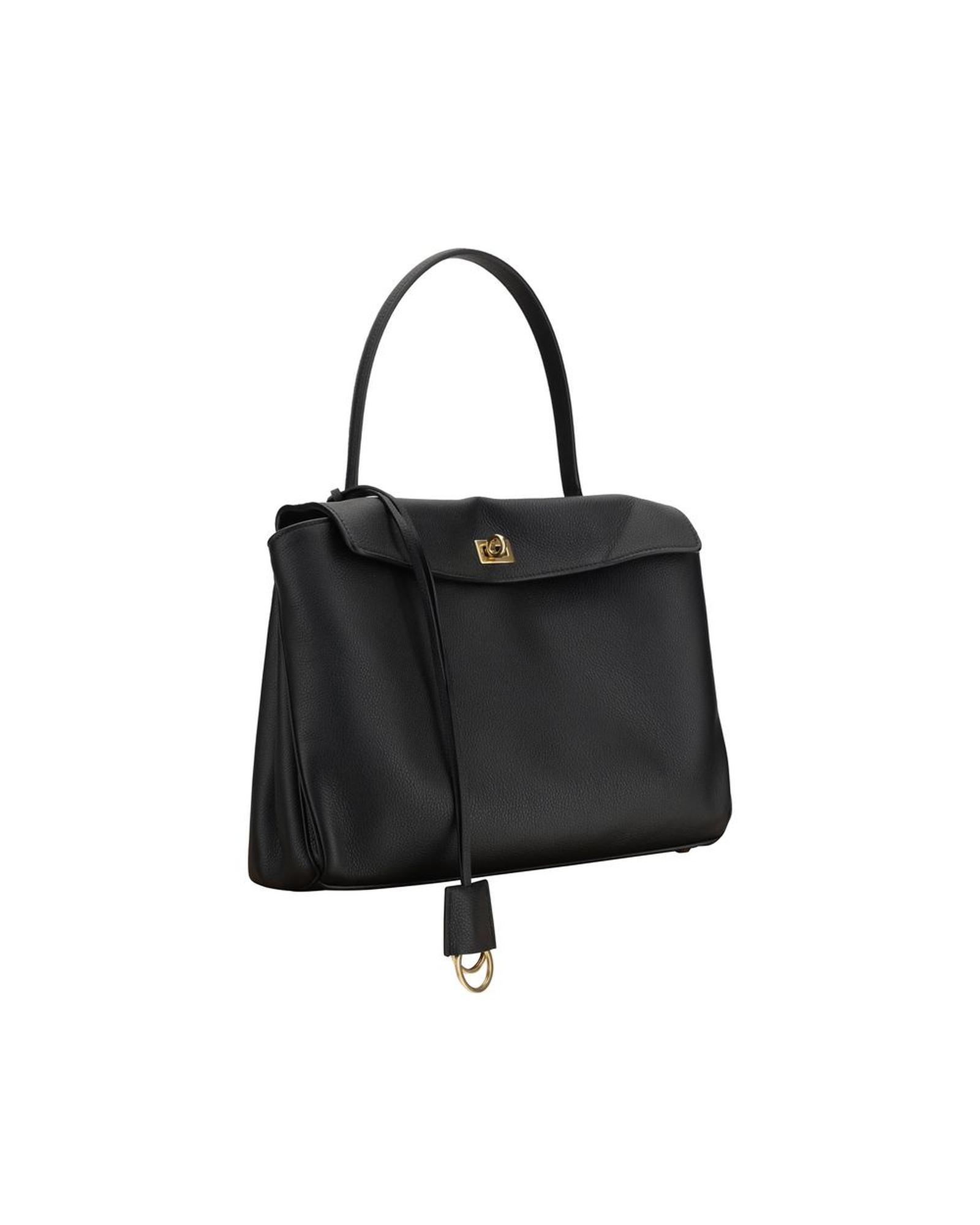 Elegant black leather handbag with gold clasp.